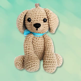 Perrito cocker spaniel mascota en crochet. Muñecos tejdos personalizados. Talykí Taller de Tejidos y diseño textil